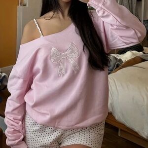 Pink Off-the-Shoulder Sweater with Bow Detail